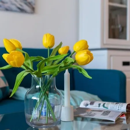 Апартаменты Strandhotel-heiligenhafen-wohnung-101-typ-iv-wasserblick Хайлигенхафен